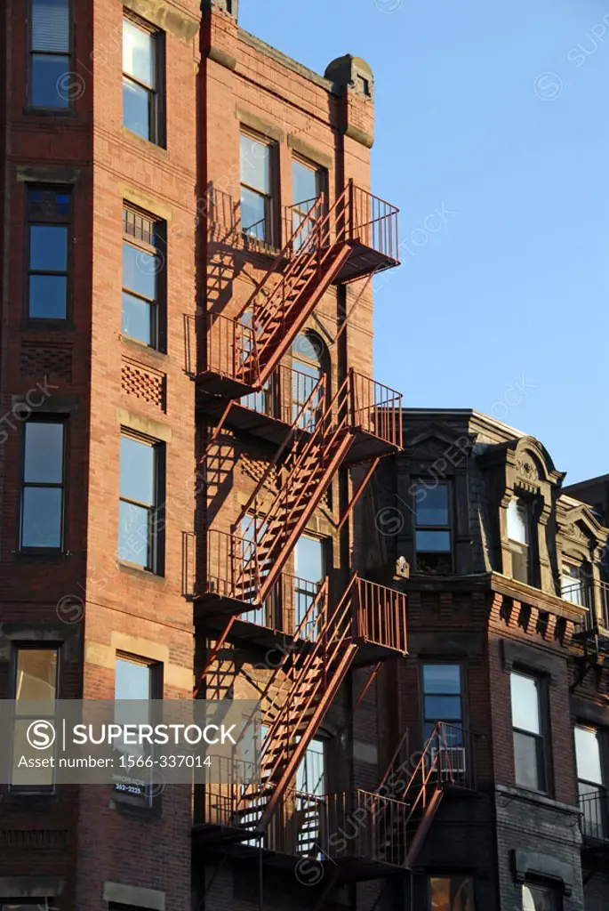 Fire escape, late afternoon sun, on a Boston´s Back Bay townhouse. USA.