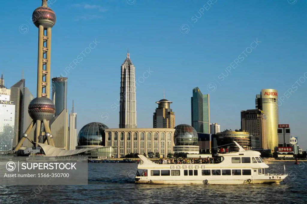 China, Shanghai, Pudong business district skyline, Huangpu Rive