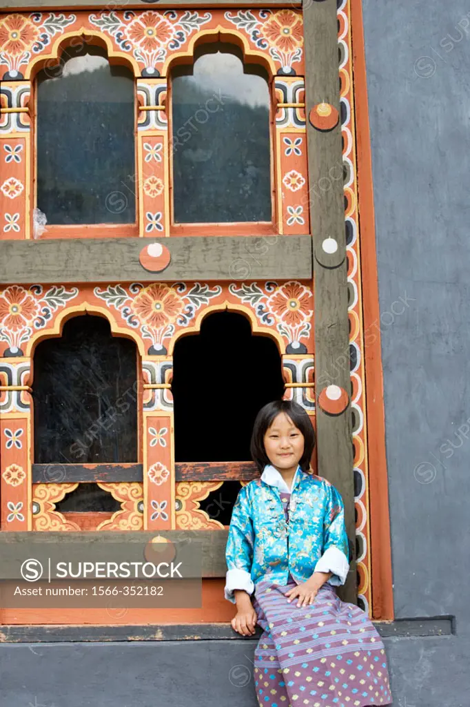 Bhutan. Thimpu. Thimpu Dzong Monastery. Buddhist Festival (Tsechu). Bhutanese little girl.