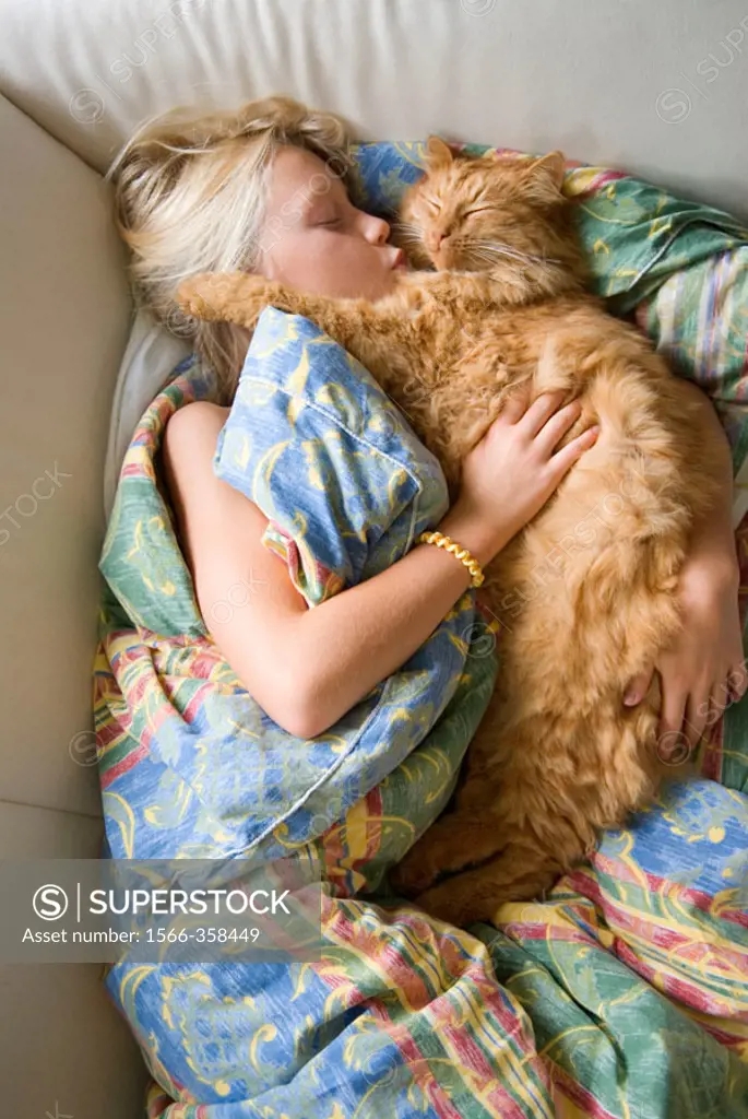 Girl resting with her cat