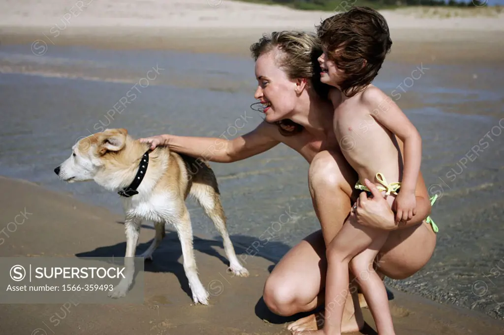 27 year old woman, girl (3 year old) and dog