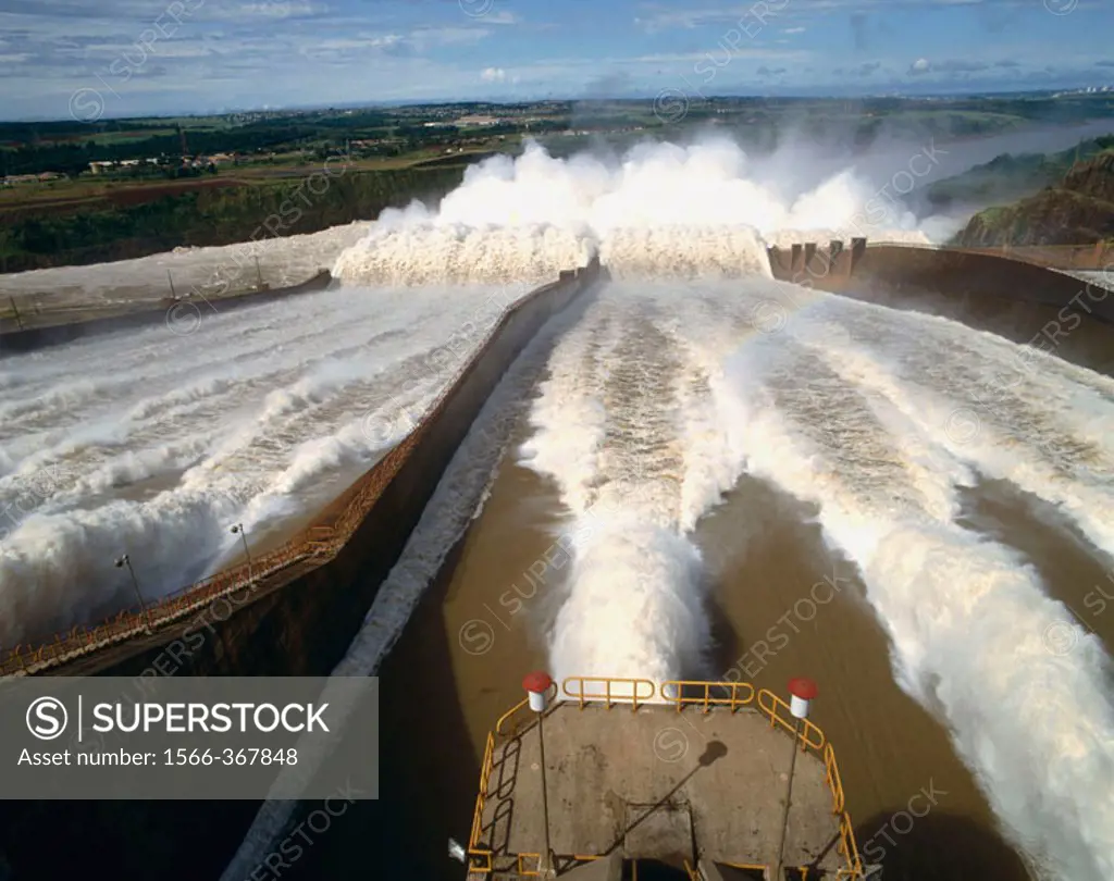 Itaipu dam spillway. Itaipu dam is the biggest hydroelectric power plant, built between Brazil and Paraguay, using Parana river water.