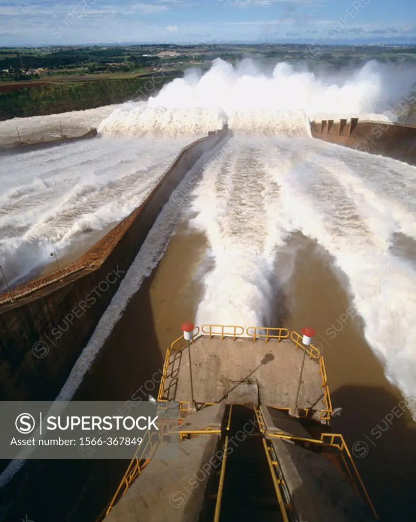 Itaipu dam spillway. Itaipu dam is the biggest hydroelectric power plant, built between Brazil and Paraguay, using Parana river water.