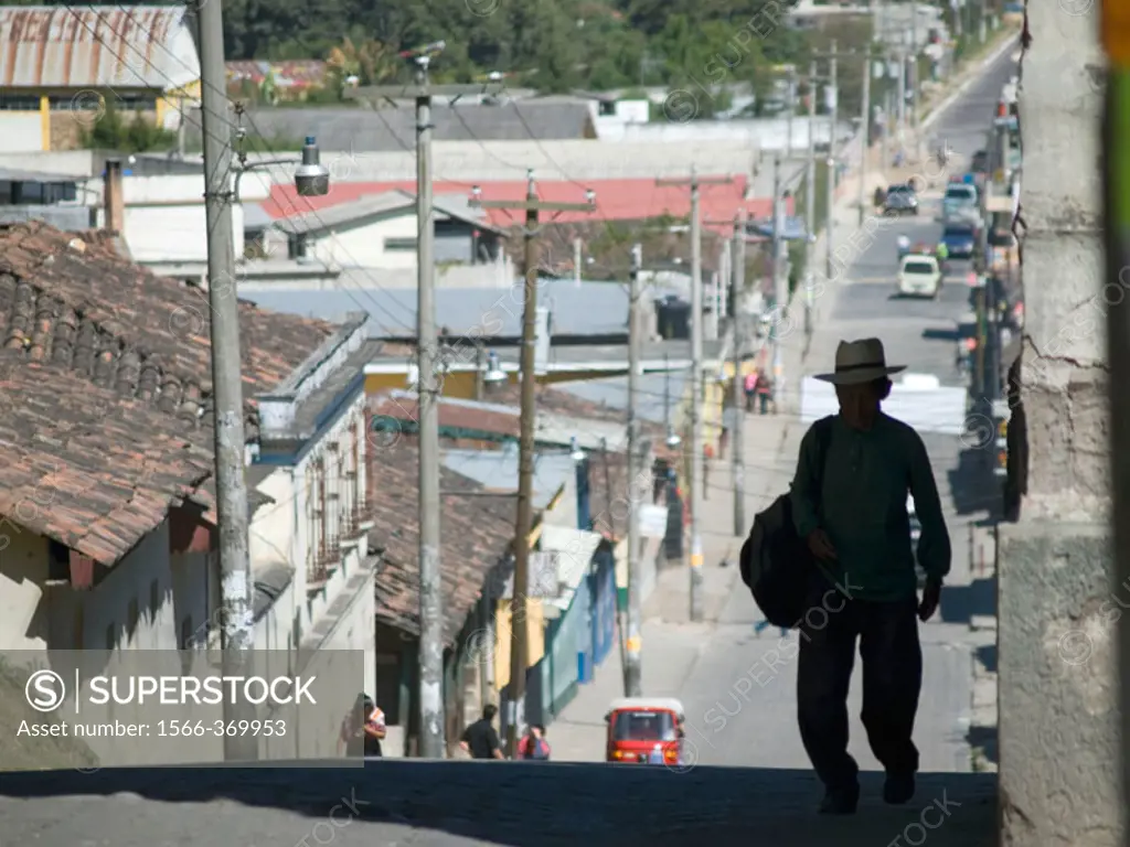 Traditionally dxressed Guatemalans walk on the streets in Chichicastenango, Guatemala