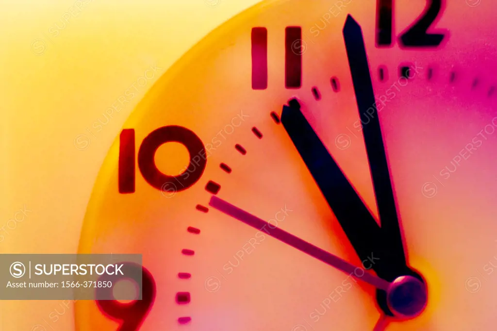 Clock hands showing 11:00