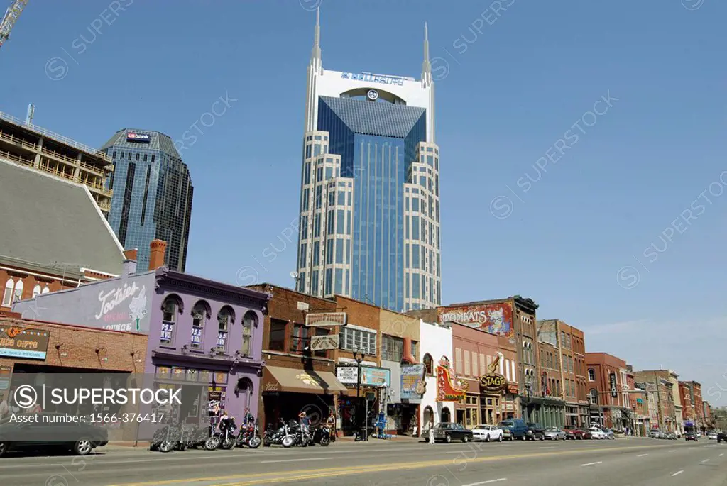 Live Music Venues along Broadway Street with Cityscape Skyline Bellsouth. Nashville. Tennessee. USA.