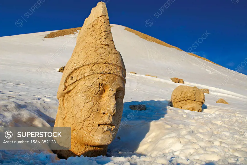Turkey. East Anatolia Province. Archeological site of Nemrut Dagi. Colossal Head at West Terrace of Hierothesion of Antiochus I. Unesco world heritage...