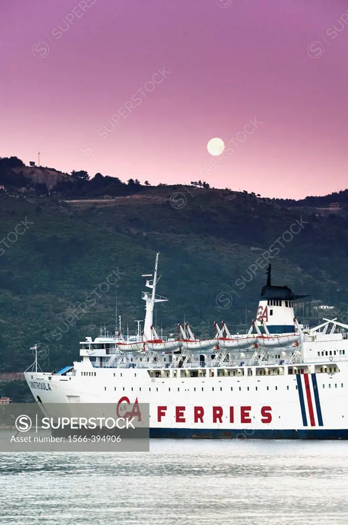 Greek Island Ferry with Moonset. Dawn. Vathy (Samos town). Samos. Northeastern Aegean Islands. Greece.