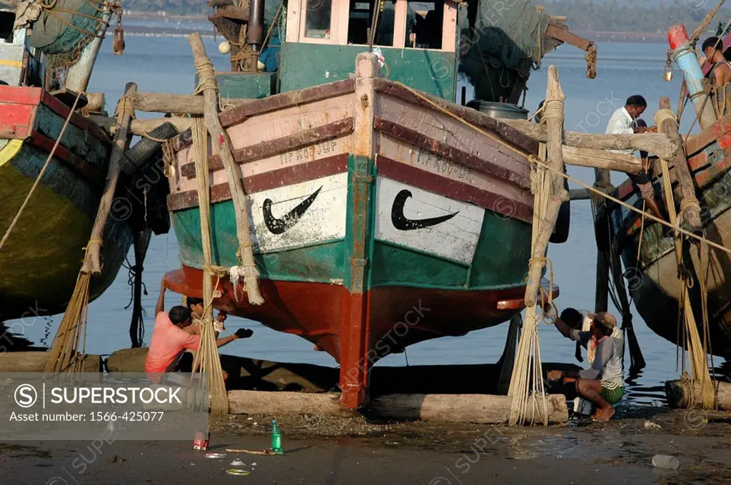 Chapora, Goa India: a fishing boat repainted at the local beach