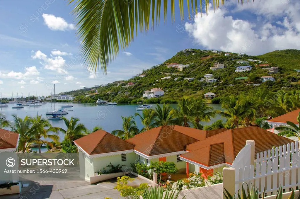 A Saint Martin home with tropical foliage overlooks Simpson´s Bay, French protectorate, Caribbean, 2008