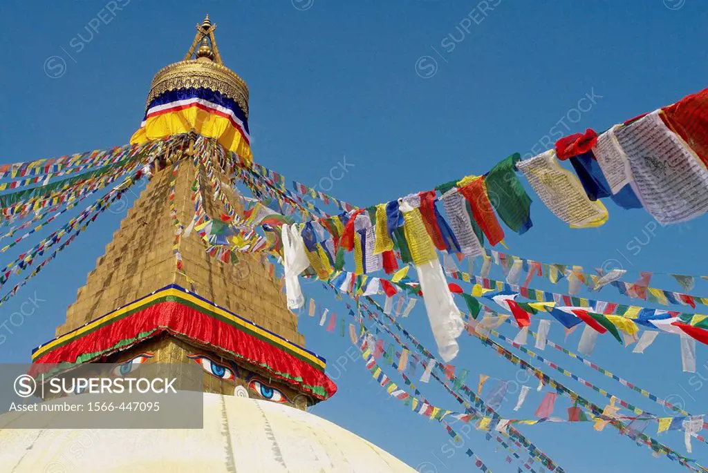 Nepal. Kathmandu valley. Buddhist stupa of Bodnath. Prayer flag.