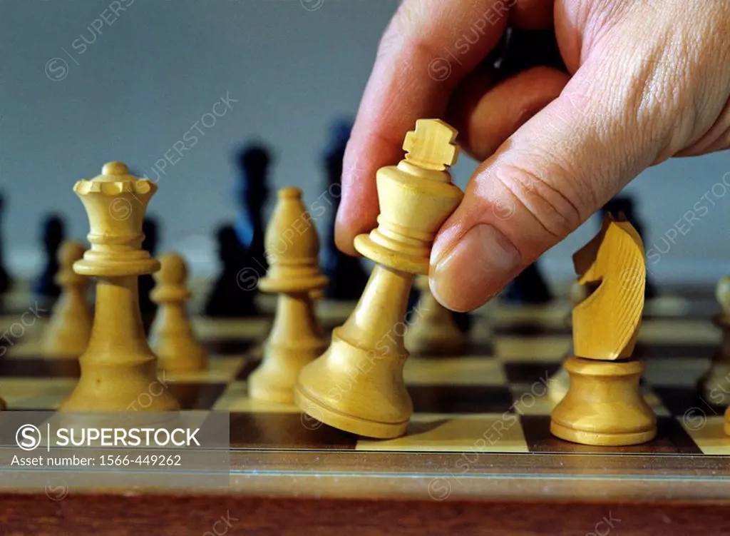 chessboard - symbolism of checkmate or putting out of action