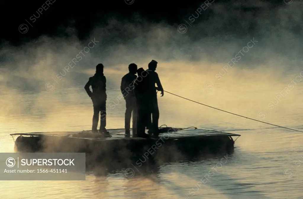Raft on misty river, Pokhara, Nepal