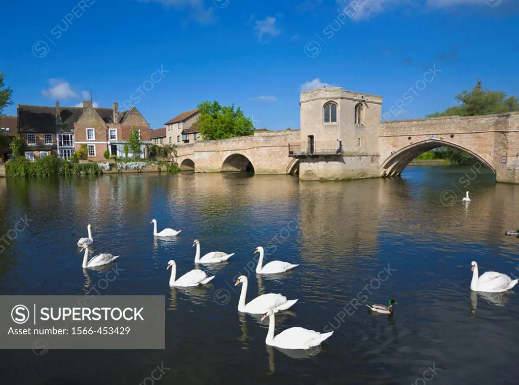 Stone arched bridge and River Ouse, St Ives, Cambridgeshire, England, UK
