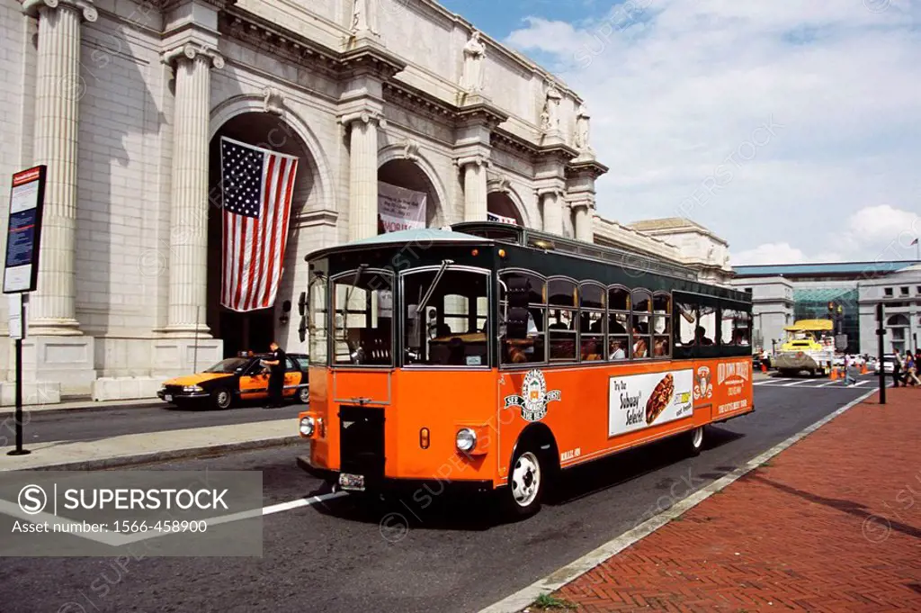 Old Town Trolley Bus driving past Union Railway Station, Washington, DC, USA
