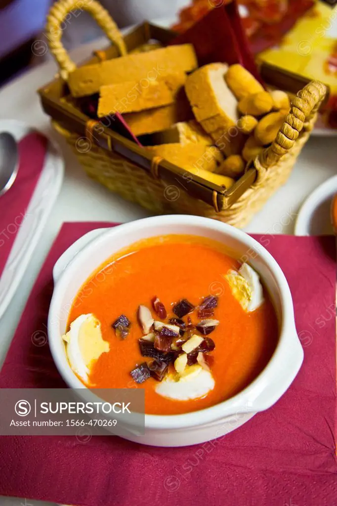 ´Salmorejo´ (typical soup based on tomato and bread) with hard-boiled egg and ham, Arcos de la Frontera. Cadiz province, Andalucia, Spain