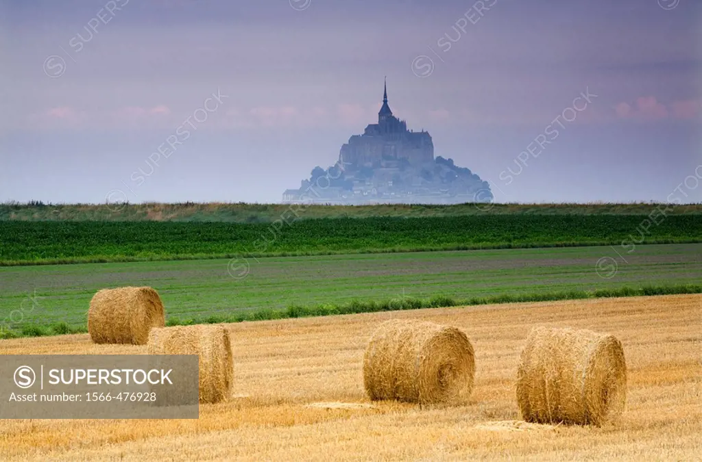 St Michael´s Mount and farm land with wheat bales, Manche Department, Basse-Normandie region, Normandy, France, Europe