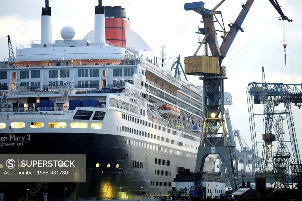 Queen Mary II laying in the dry dock of a Blohm & Voss shipyard in Hamburg, Northern Germany, Europe