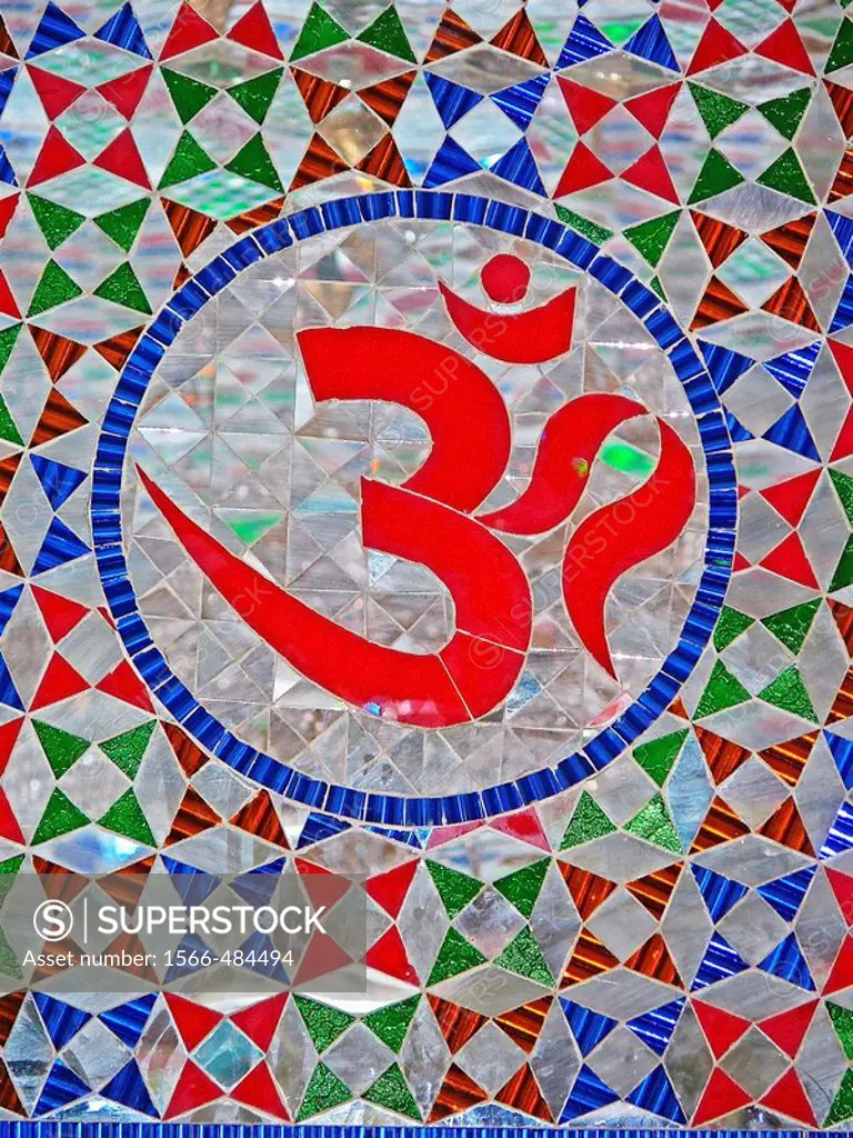 OM symbol of Hinduism, A holy sign called om, cutout in glass in lord Viththal madir,temple, Viththalwadi, withthalwadi, Pune, Maharashtra, India