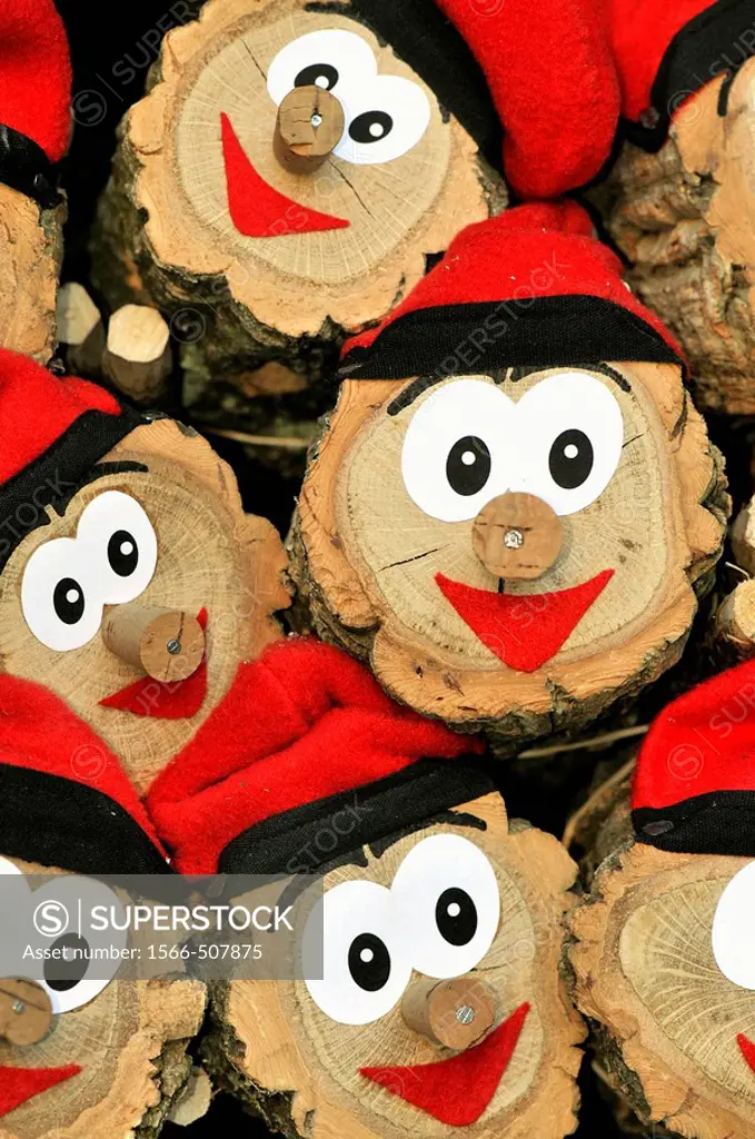 Christmas logs (mythological character relating to a christmas tradition in Catalonia) for sale at fair. Fira de Sta Llúcia. Barcelona. Catalonia. Spa...