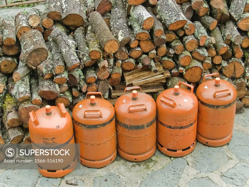 Firewood and butane gas cylinder, Beget. Alta Garrotxa, Girona province, Catalonia, Spain