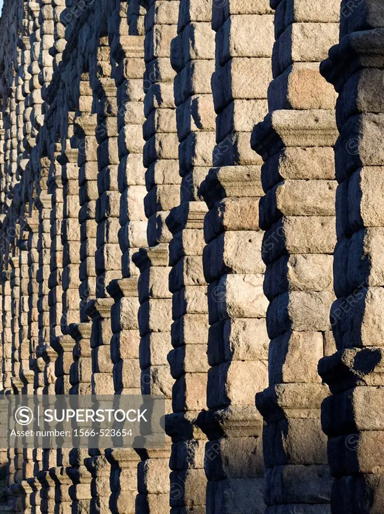 Arches and pillars built with granite blocks without mortar in the Roman aqueduct of Segovia - Castilla-León - Spain