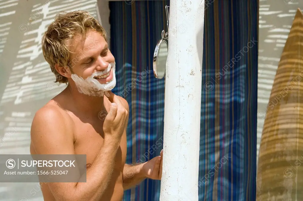 Man shaving in the morning