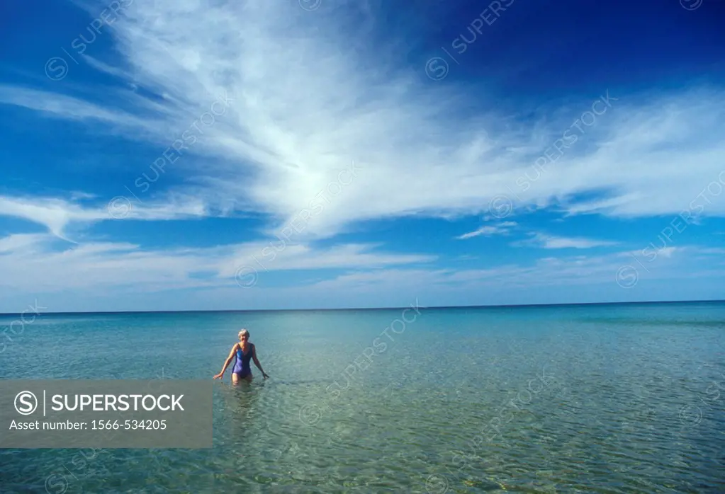 Pictured Rocks National Lakeshore, Michigan - Susan Newell swims in Lake Superior at Pictured Rocks National Lakeshore in Michigan´s Upper Peninsula  ...