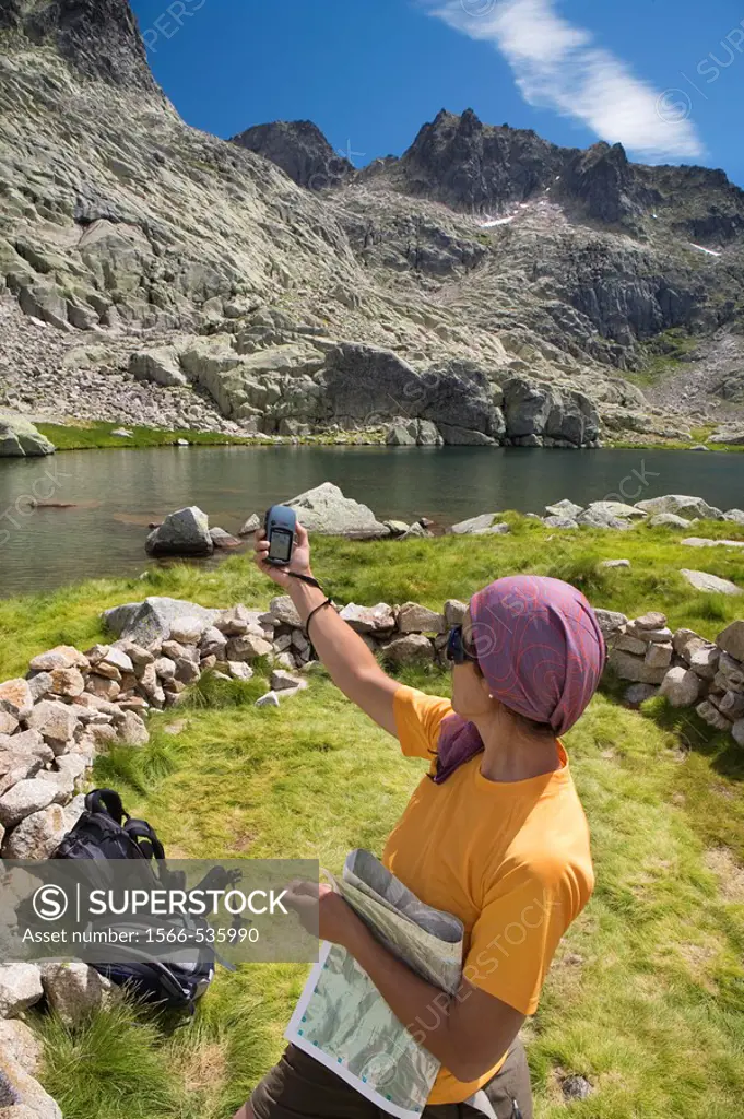 Cinco Lagunas Valley  Garganta del Pinar  Woman practice mountaineering in the mountains of the Sierra de Gredos National Park  Zapardiel de la Ribera...