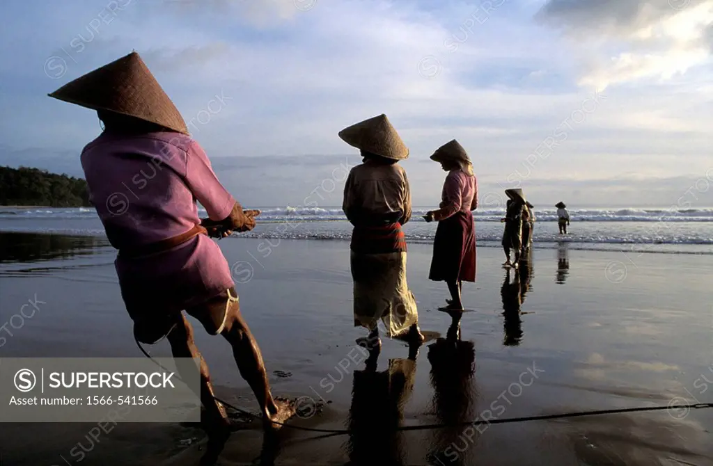 Fishermen at Pangandaran beach, Java, Indonesia