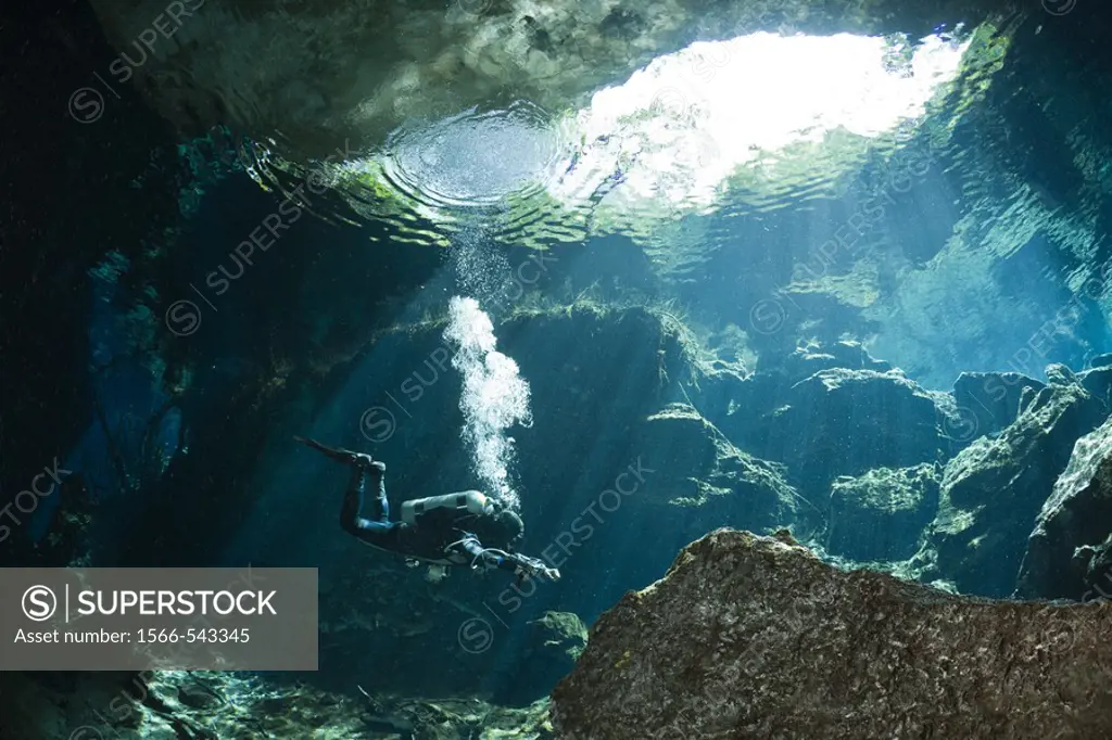 Cave Diver in Chac Mool Cenote, Playa del Carmen, Yucatan Peninsula, Mexico