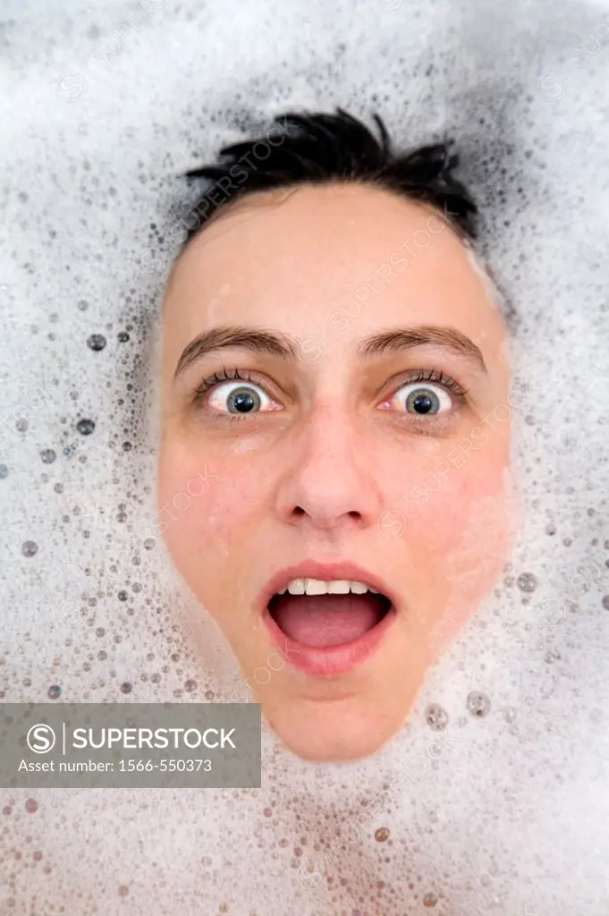 young woman face having a bath