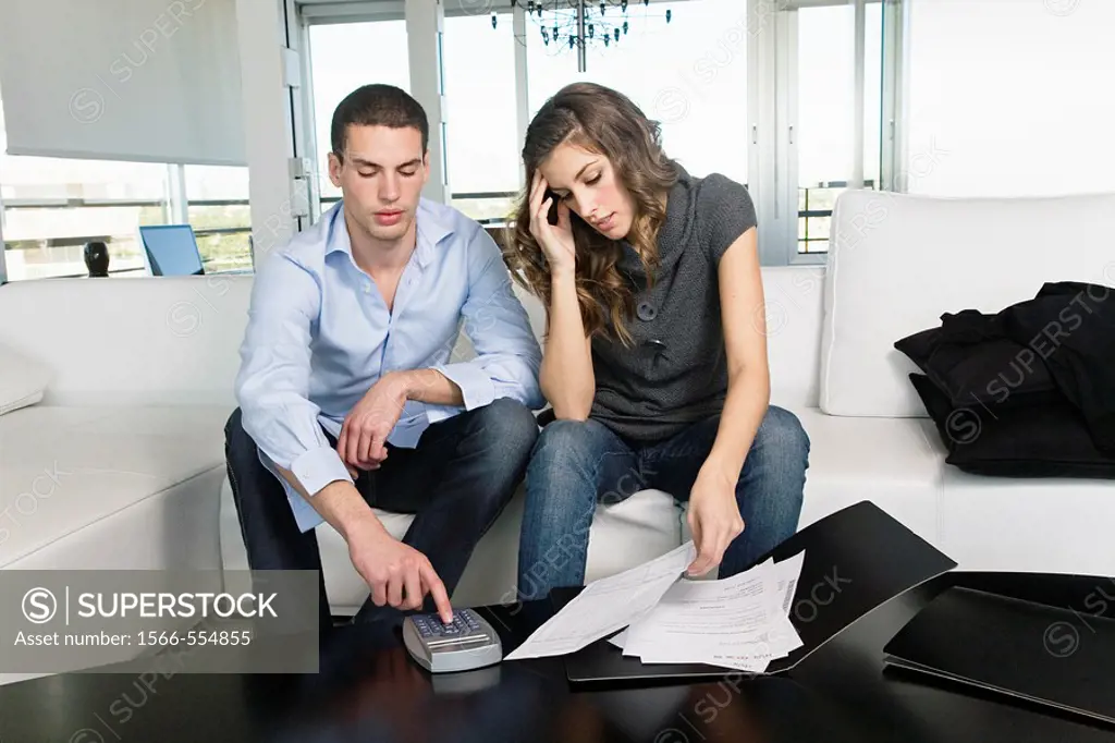 Young couple with financial stress