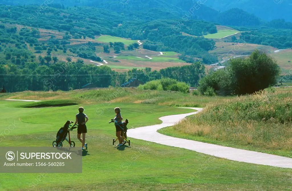 Two golfers on the fairway of Haymaker golf course in Steamboat Springs, Colorado, USA