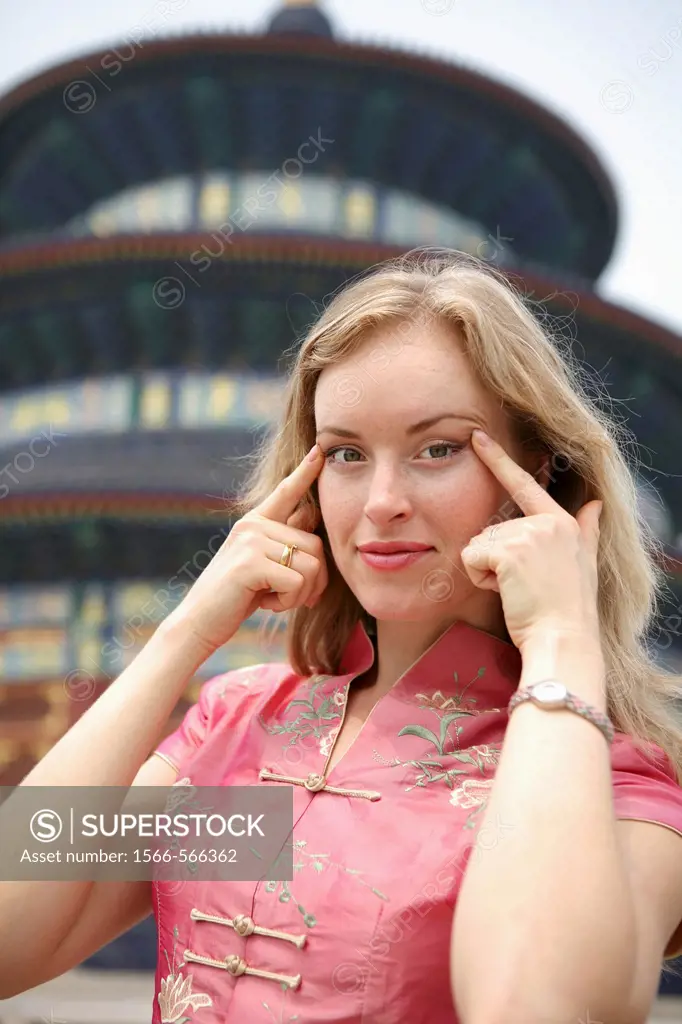 Woman joking in the Temple of Heaven. Beijing. China.