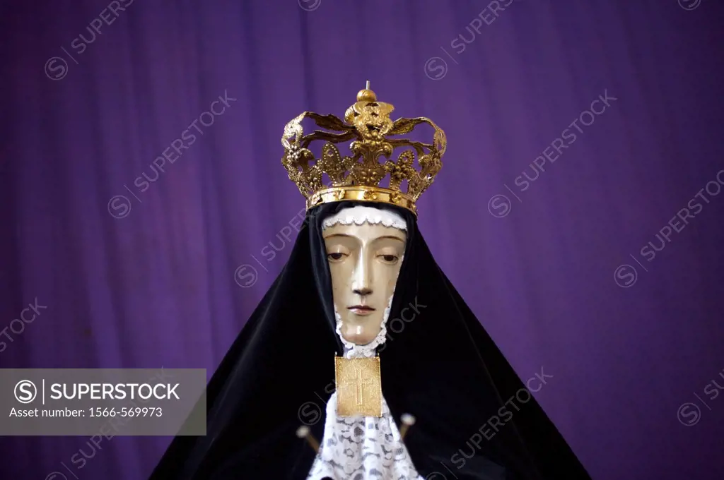 The Virgin of Solitude sits on display in a church before a holy week procession in Oaxaca, Mexico, April 11, 2009
