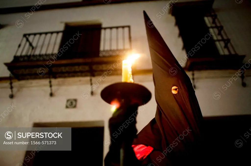 A penitent participates in a Holy Week procession in the town of Prado del Rey in southern Spain´s Cadiz Sierra region in Andalucia. Easter procession...