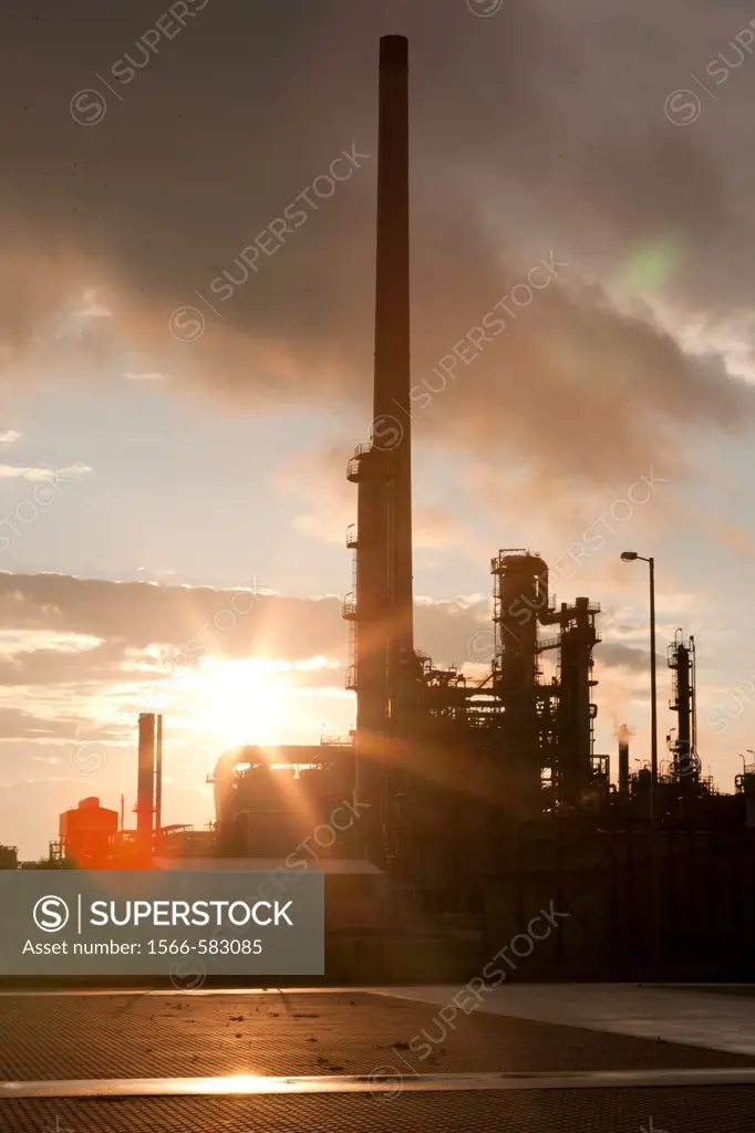 Sunset over an oil refinery in germany.