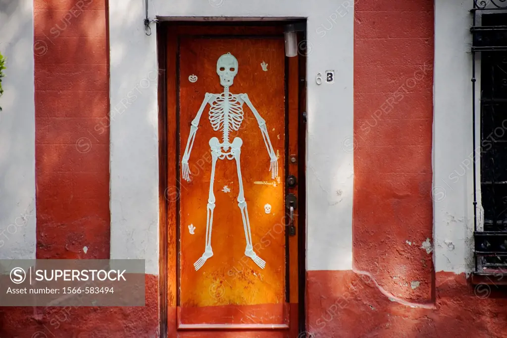 A skeleton decorates a home´s door in Coyoacan ahead of Day of the Dead celebrations, Mexico City.