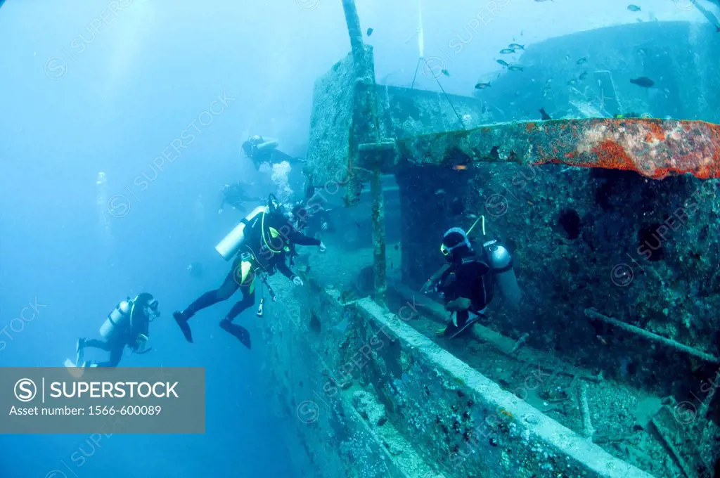 Divers at a shipwreck at Ras Mohammed National Park, Red Sea, Sinai, Egypt,