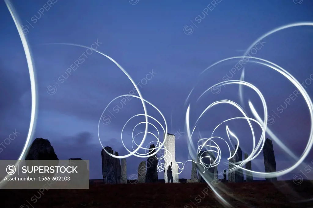 Callanish standing stones at night illuminated by lights, Isle of Lewis, Outer Hebrides, Scotland