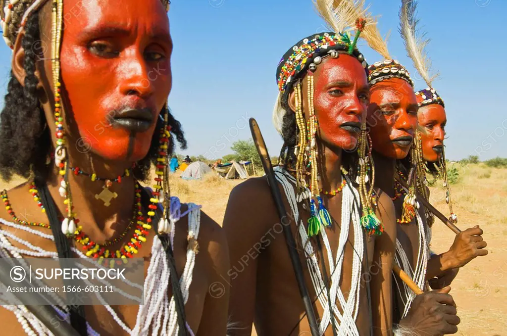 Young Bororo men preparing for traditional dance during the Gerewol festival, the most important meeting for Bororo tribe, Niger