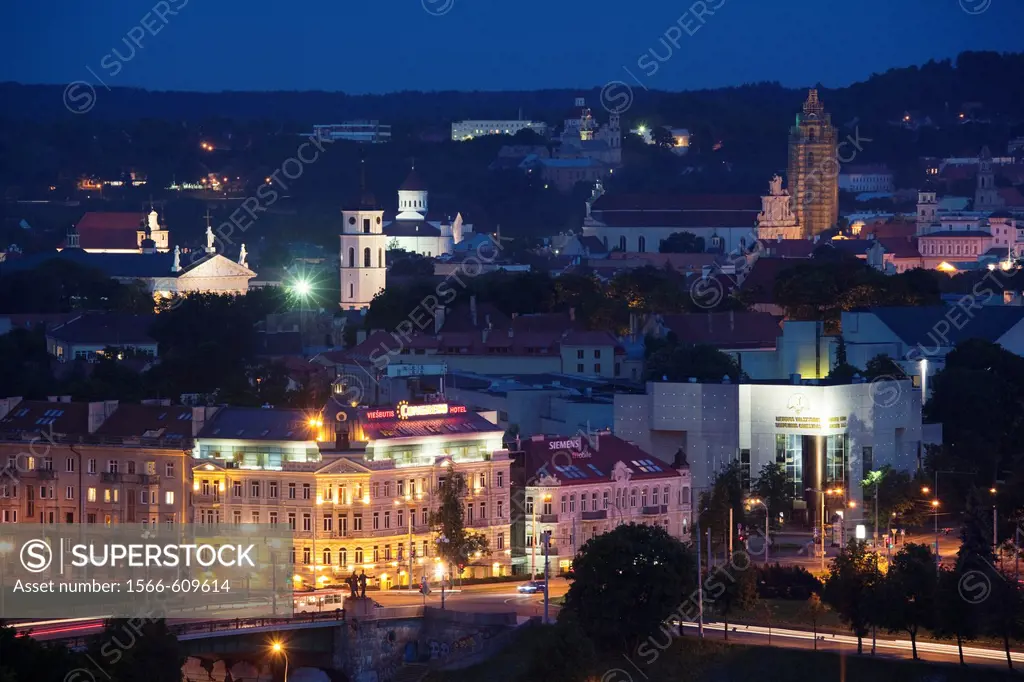 Lithuania, Vilnius, elevated view of Old Town and Green Bridge, evening