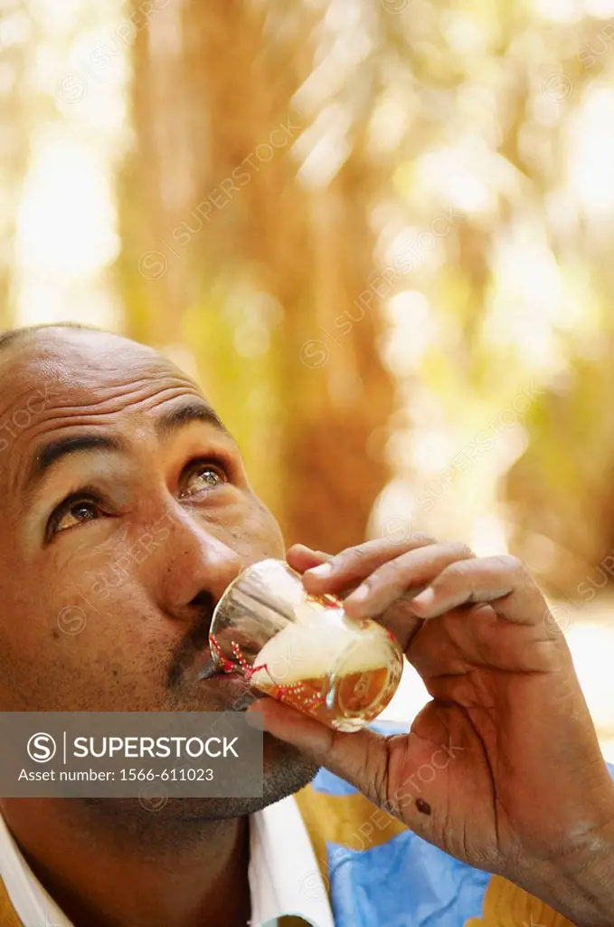 Man drinking tea, Chinguetti. Adrar Plateau, Sahara Desert, Mauritania