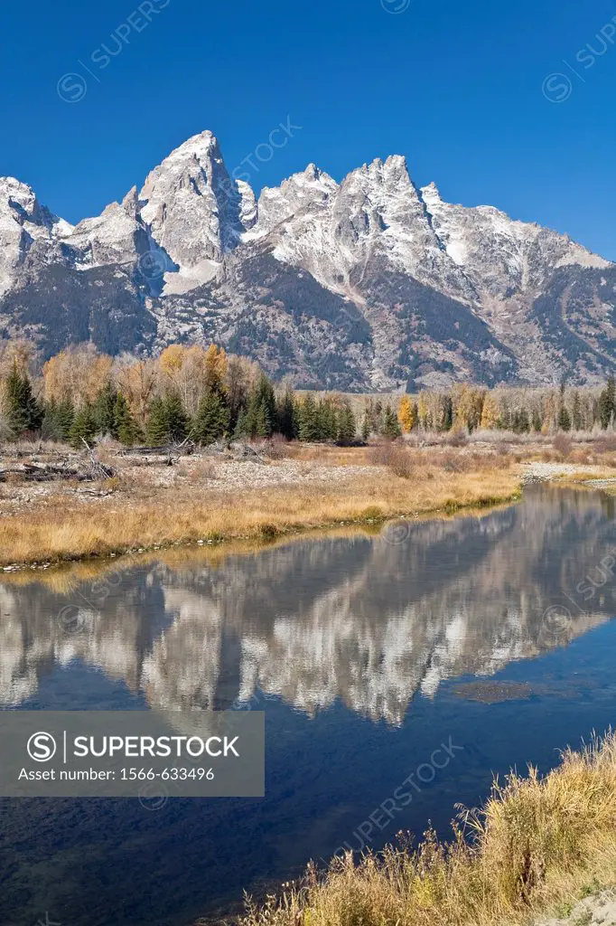 Reflected light on water from the Grand Teton Mountain Range, outside of Jackson Hole, Wyoming  This image was shot from the Schabawacker Landing on t...