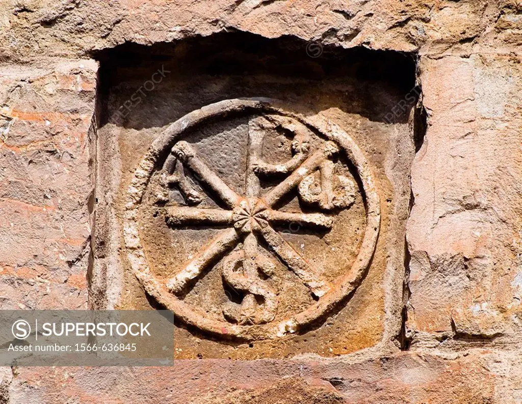 Chi-Rho monogram on the Romanesque collegiate church of Santa Maria (12th century), Ainsa. Sobrarbe, Huesca province, Aragon, Spain
