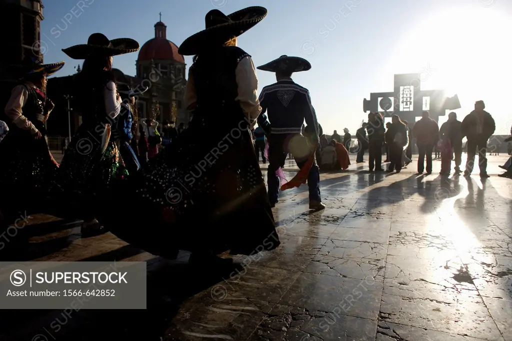 Pilgrims dance outside the Our Lady of Guadalupe Basilica in Mexico City, December 8, 2010  Hundreds of thousands of Mexican pilgrims converged on the...