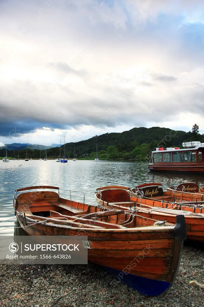Rowing Boats moored on the shore of Windermere with Loughrigg Fell in the background, Waterhead, Lake District National Park, Cumbria, England