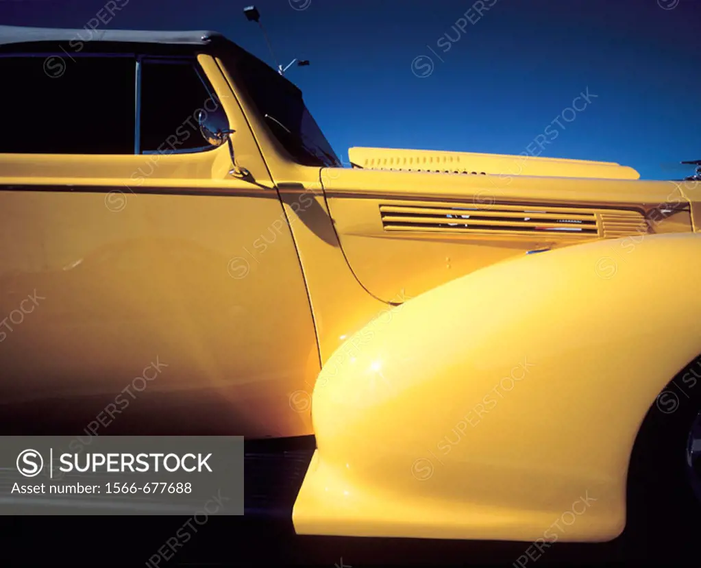 Yellow fender of hot rod car