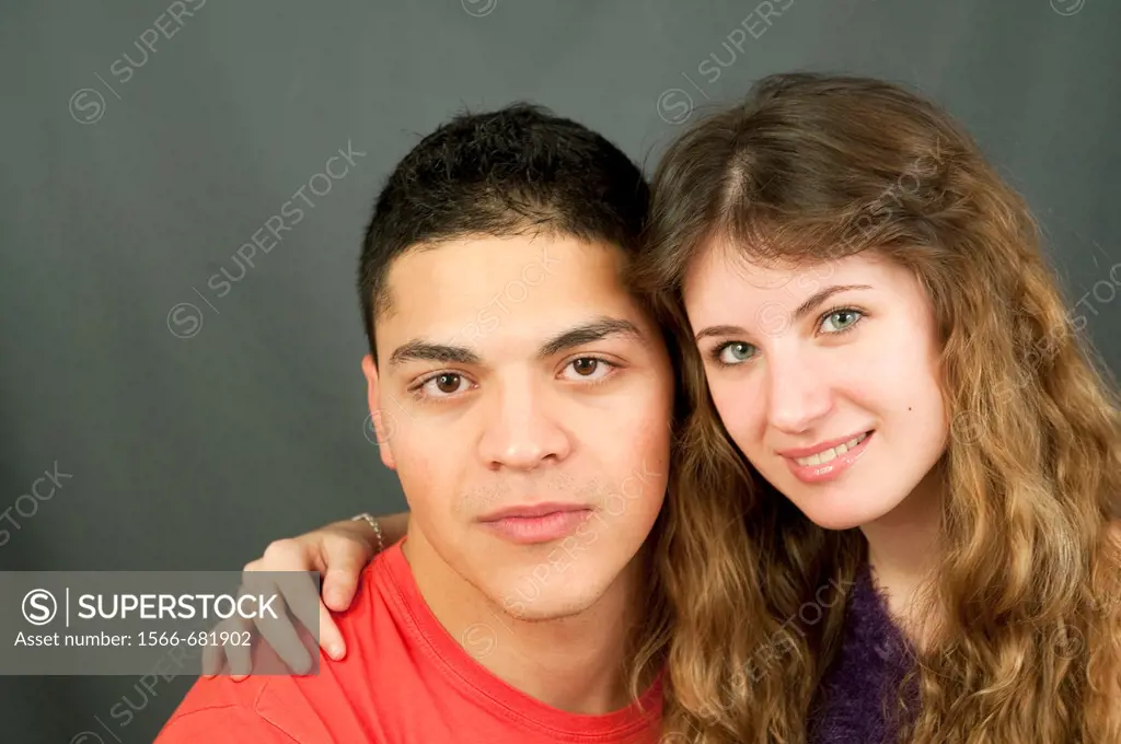 Young couple looking at the camera